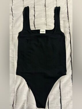 Dynamic Women’s Black Tank Bodysuit